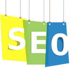 SEO als Aufhänge-Schild mit gelb, grün und blauem Hintergrud